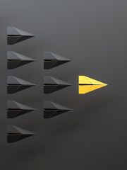 Leadership concept, yellow leader plane leading black planes, on black background with empty copy space on right side. 3D Rendering